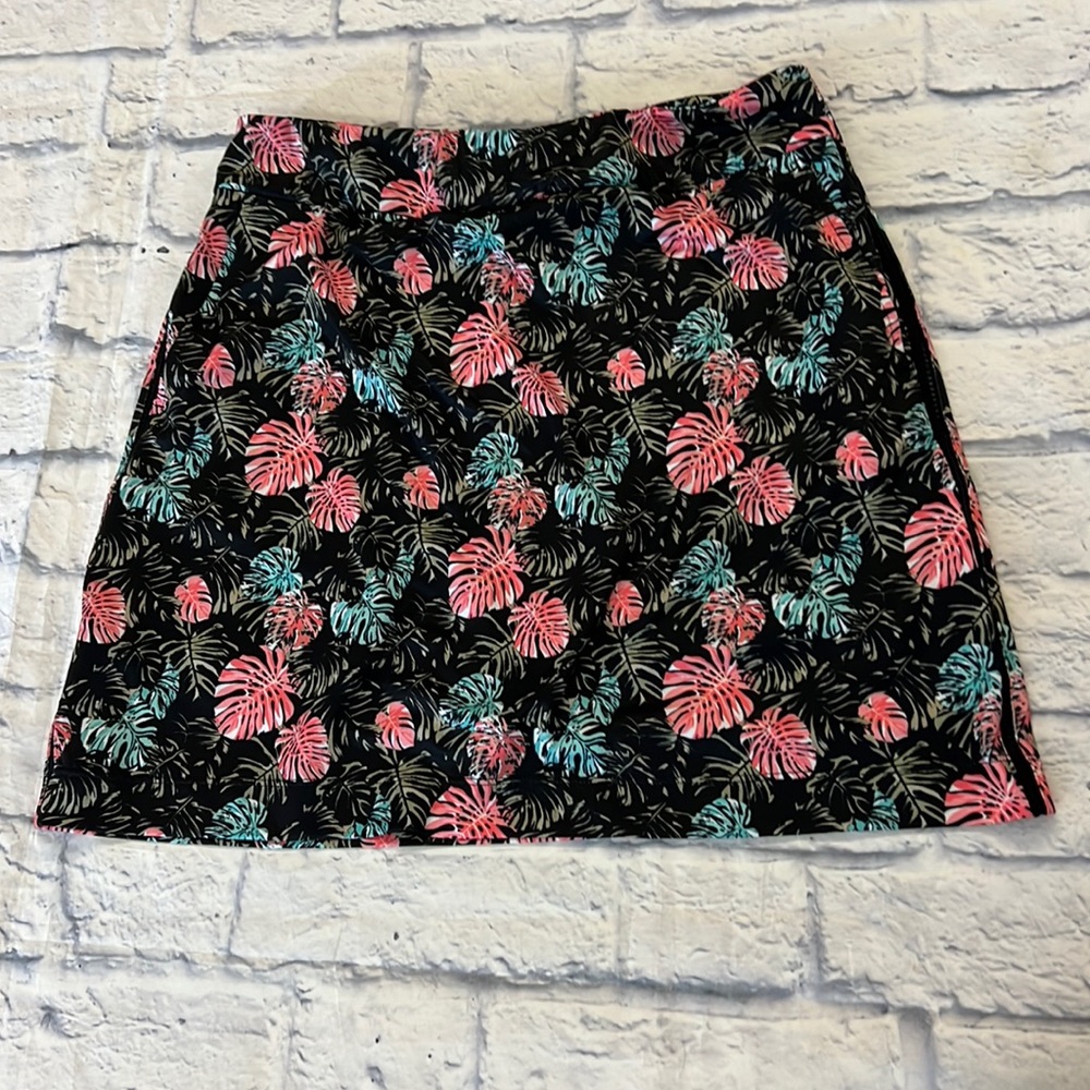 EPNY golf skort sz S. Pockets+50+ solar tech fabric. Palms pink and blac…